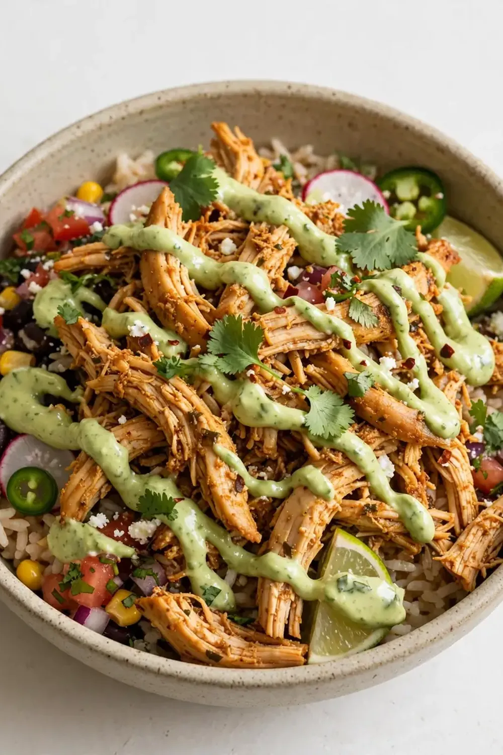 Shredded Mexican Chicken Bowls with Avocado Crema